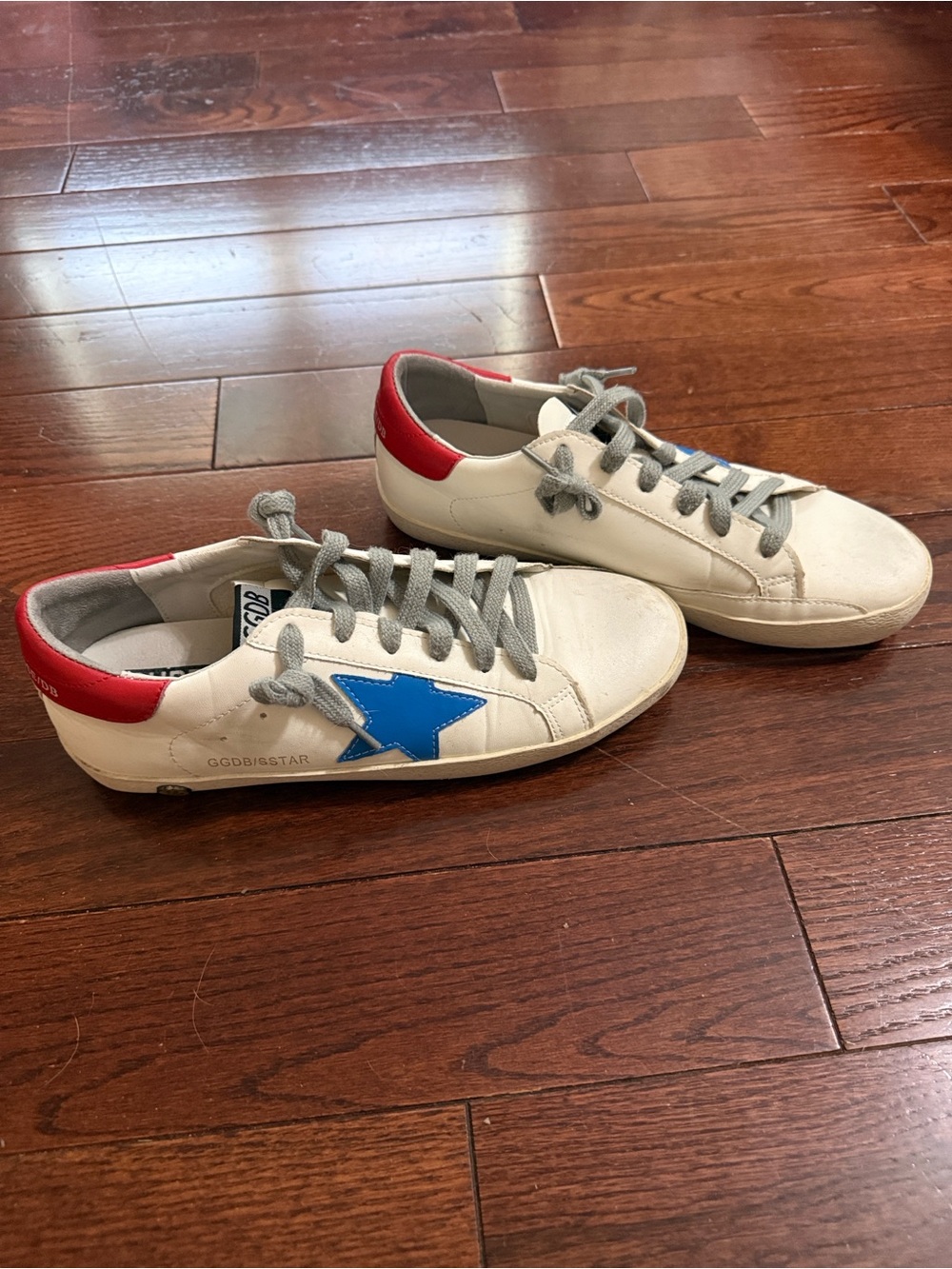 White Sneakers with Blue Star and Red Heel